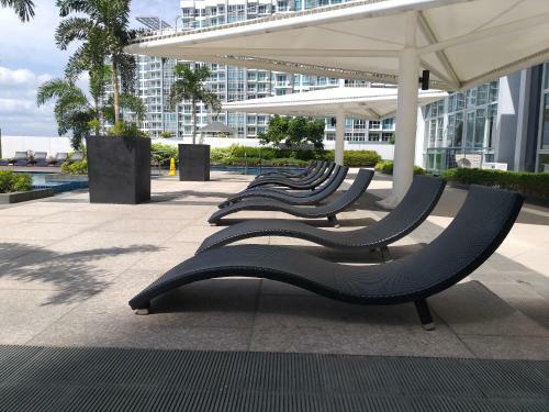 Apartamento Mactan Newtown With Sun Set And Garden View