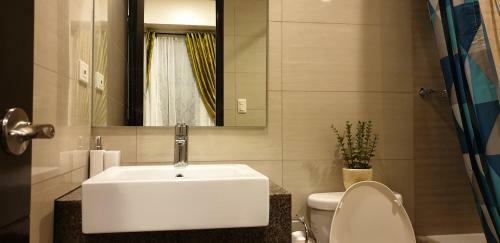 Apartamento Mactan Newtown With Sun Set And Garden View