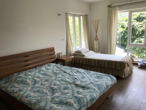 Villa Bi?t Th? 2 T?ng Hoa Trau