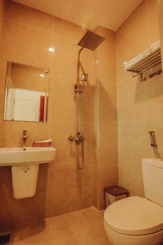 Apartamento Ngan Pho Studio & Hotel