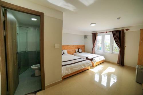 Hotel Kh�ch S?n Quang Minh ?� L?t