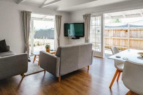 Apartamento Te Puna Cottage Gardens B&B
