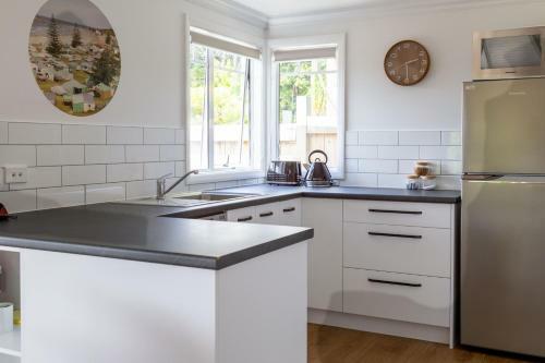 Apartamento Te Puna Cottage Gardens B&B