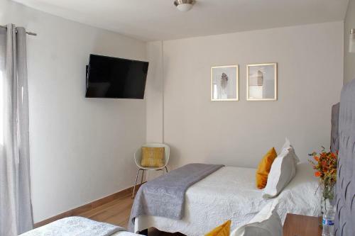 Hostal Suites Ciento 37