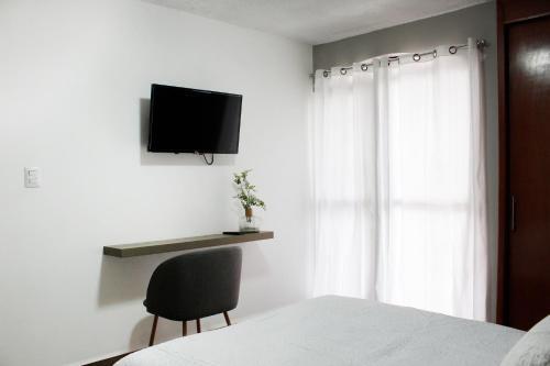 Hostal Suites Ciento 37