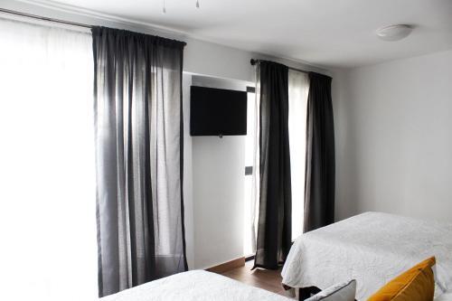 Hostal Suites Ciento 37