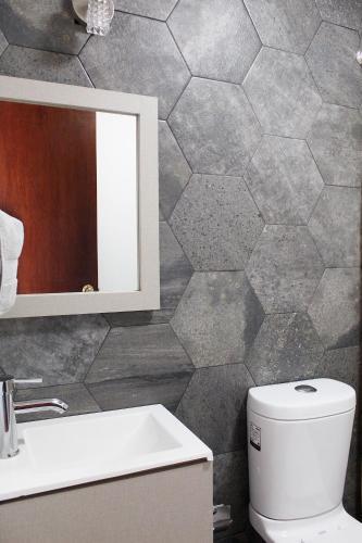 Hostal Suites Ciento 37
