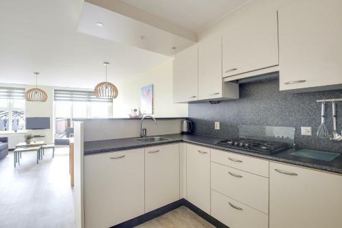 Apartamento de Trintel Op 1e Verdieping Met Ruim Terras En Zeezicht