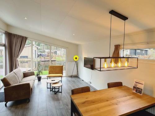 Modern Chalet With A Dishwasher, Located On A Pond