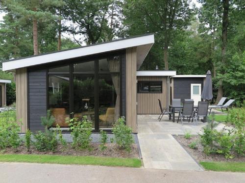 Spacious Chalet With Decorative Fireplace, Located On The Veluwe