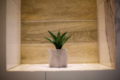 Apartamento Garrison's Suites