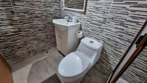 Hostal Blue House Departamento - Caba�a - Casa