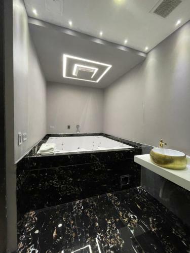 Apartamento 1million Suites