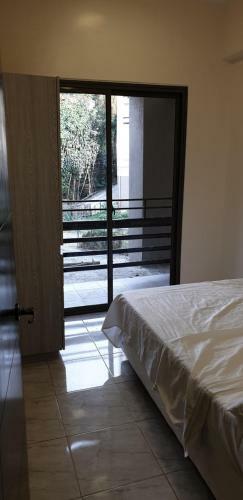 Apartamento Goshenland Tower Condo