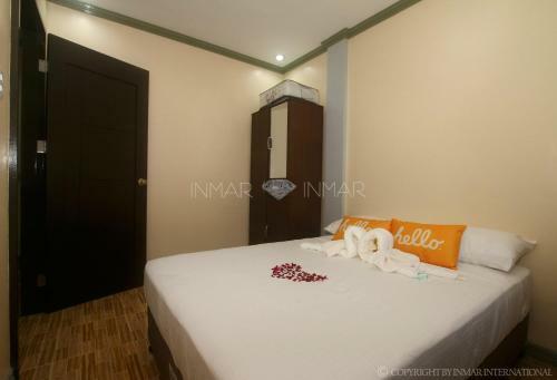 Aj Residences Apartelle