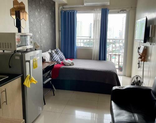 Apartamentos Condo Unit With Balcony In Manila
