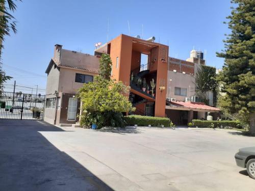 Apartamento Genesis Suites / Lofts