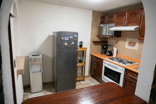Casa de 4 Pisos Con Gym, Terraza, Jacuzzi Y Oficina
