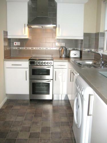 Hostal Kew House And Apartments