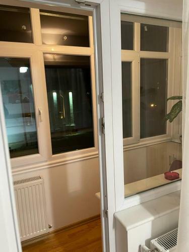 Apartamento Garsonier? �n Regim Hotelier