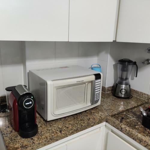 Apartamento Dulce Pitangueiras Guaruj� Com Varanda