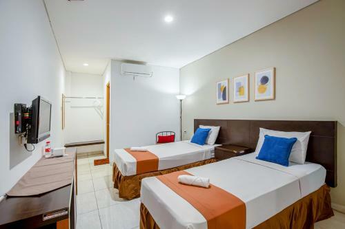 Prime Cailendra Hotel Redpartner