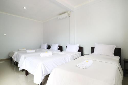 Hostal The Wina Echo Beach Guest House
