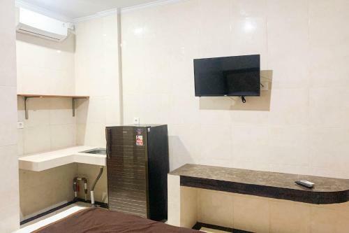 Hotel Rumah Kost Widia Grha Denpasar Redpartner