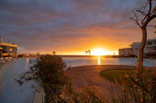 Apartamento Condo Frontbeach, Pool