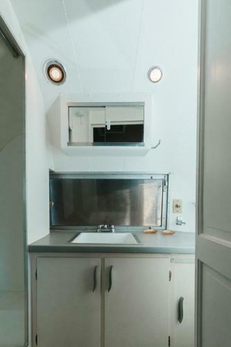 Silver Airstream Glamping & Rental