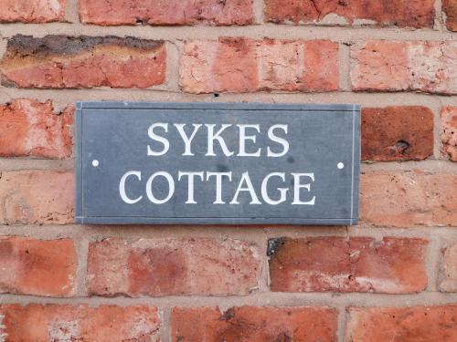 Apartamento Sykes Cottage