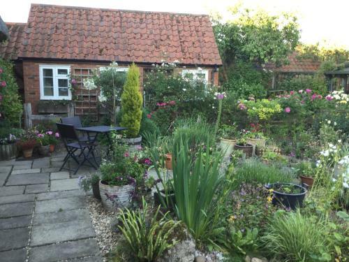 Apartamento Moat Cottage Barns