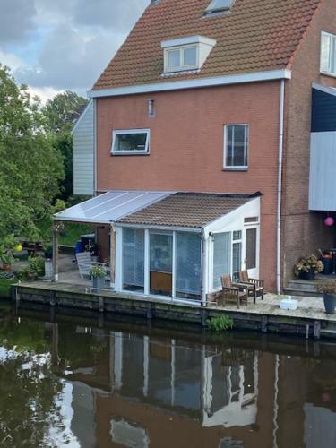 Characteristic Detached House Next To Water