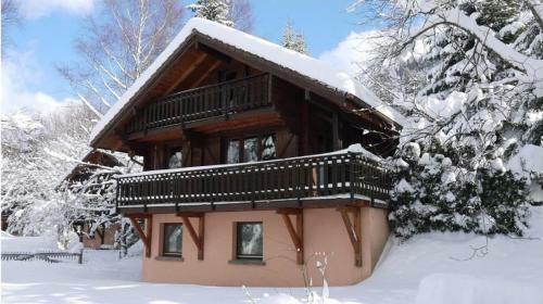 Le Skieur Chalet En Bois