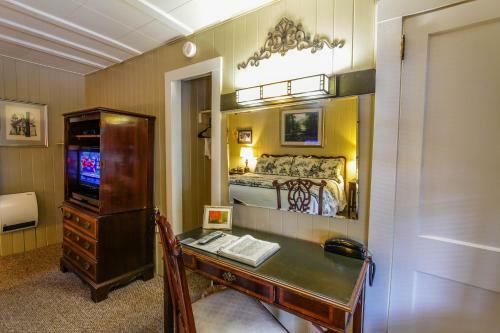 Posada Mountainaire Inn And Log Cabins
