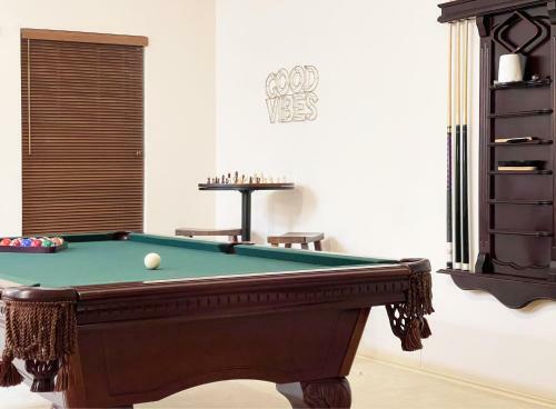 This Is It! Hot Tub+pool Table+pac-man = Fun!
