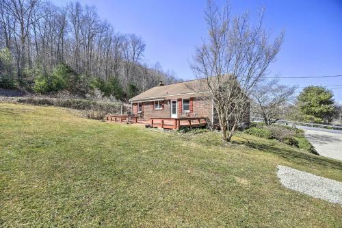 Quaint Creekside Home With Spacious Deck And Yard