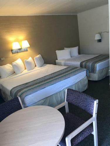 Motel Western 6 Gun