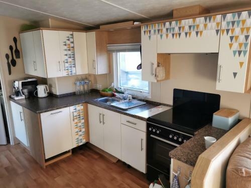 Mobilhome Gd Luxe Bois Masson 3ch 2sdb 4 Funpass Offerts (2a 2e)