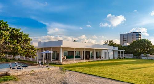 Stunning Beachfront Hacienda Style Property, East Of Progreso