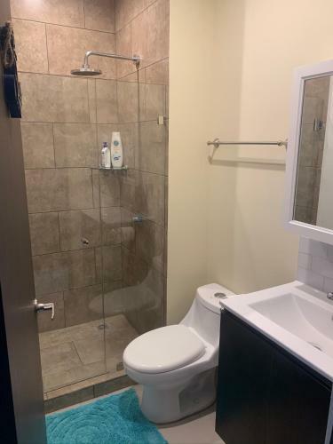 Apartamento Poseidon's Beachfront Sanctuary