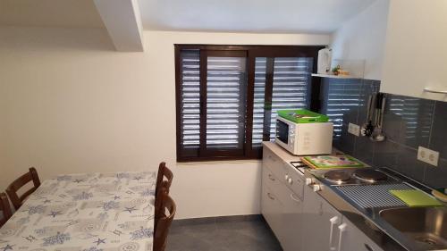 Apartments With A Parking Space Seget Vranjica, Trogir - 17923