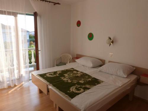 Apartments With A Parking Space Palit, Rab - 14996