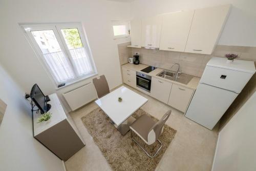 Apartments With A Parking Space Palit, Rab - 4970