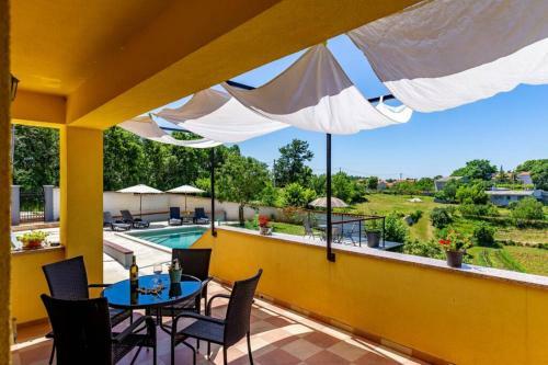 Sunny Yellow House With A Pool