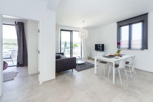 D. Marine Apartments