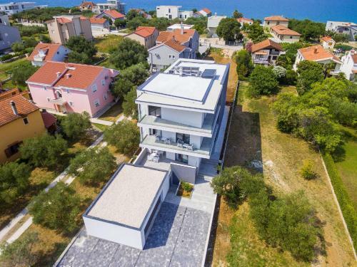 D. Marine Apartments