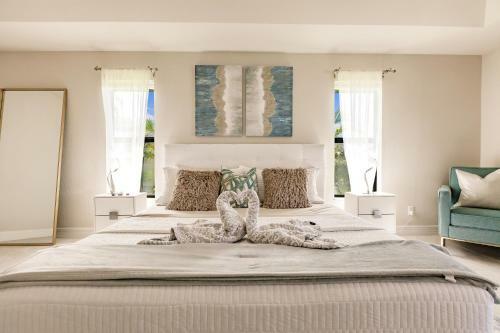Waterfront Home With Golf Access & Heated Pool