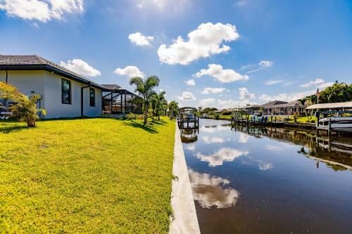 Waterfront Home With Golf Access & Heated Pool
