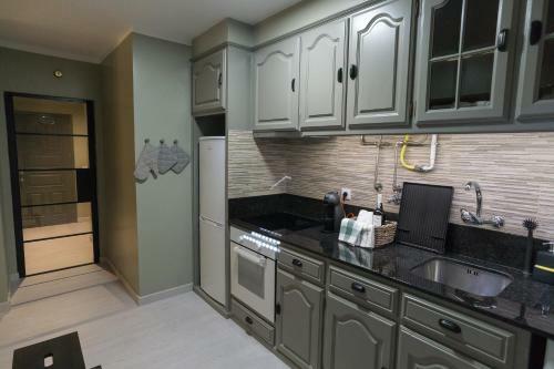 Apartamento The Green Wall House